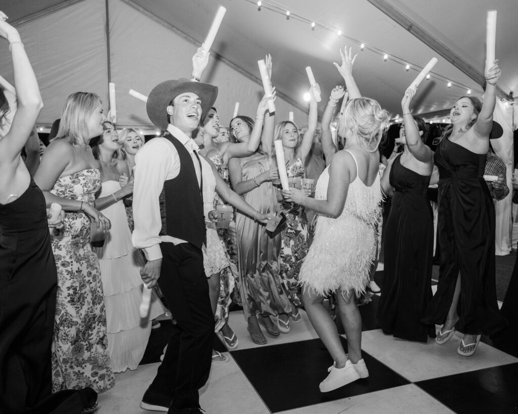 The Landing Lawn reception setup with black-and-white dance floor